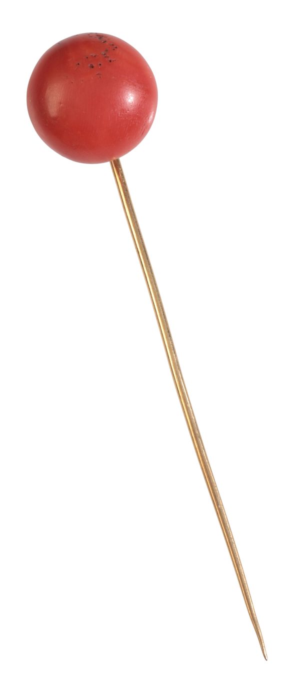 A CORAL STICK PIN