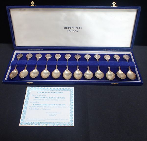 JOHN PINCHES OF LONDON; A SET OF TWELVE SILVER ZODIAC TEASPOONS