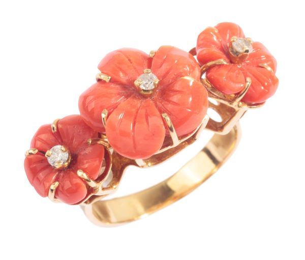 A CARVED CORAL AND DIAMOND RING