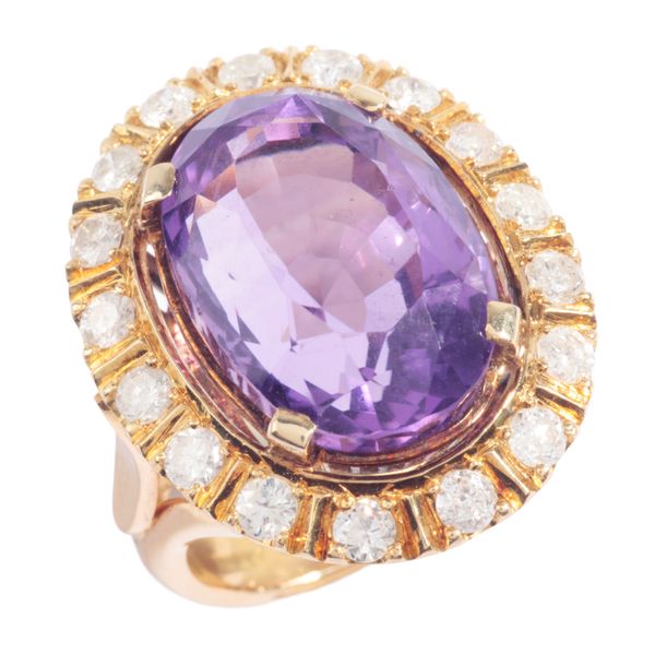 AN AMETHYST AND DIAMOND CLUSTER RING