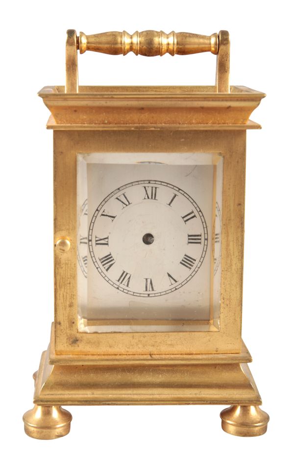 AN ENGLISH BRASS CARRIAGE CLOCK