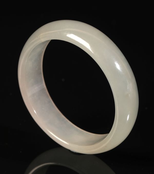 A CHINESE JADE RING BANGLE