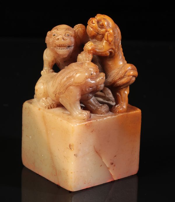 A CHINESE SOAPSTONE 'MYTHICAL BEASTS' SEAL