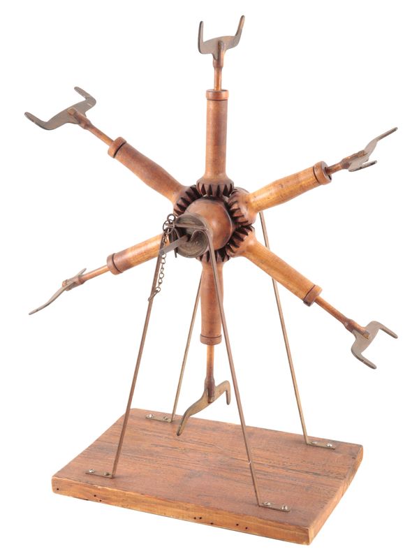 A 19TH CENTURY FRUITWOOD LINE WINDER