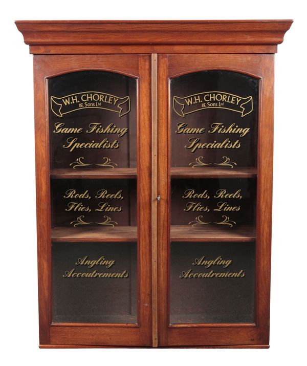 A 'W.H. CHORLEY & SONS... GAME FISHING SPECIALISTS' MAHOGANY WALL-MOUNTED CABINET