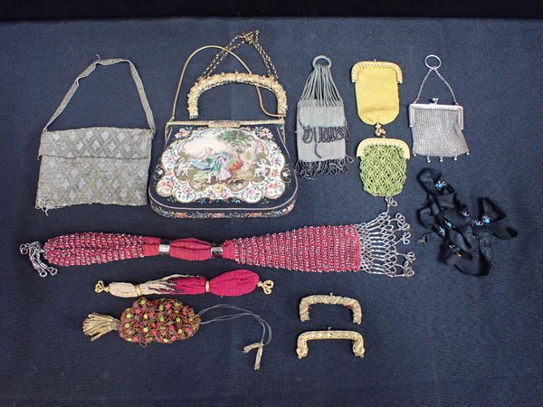 A COLLECTION OF BEADED AND WOVEN PURSES AND BAGS