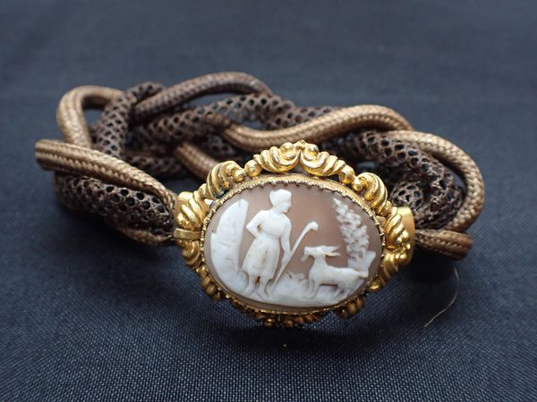 A VICTORIAN CAMEO AND WOVEN HAIR BRACELET