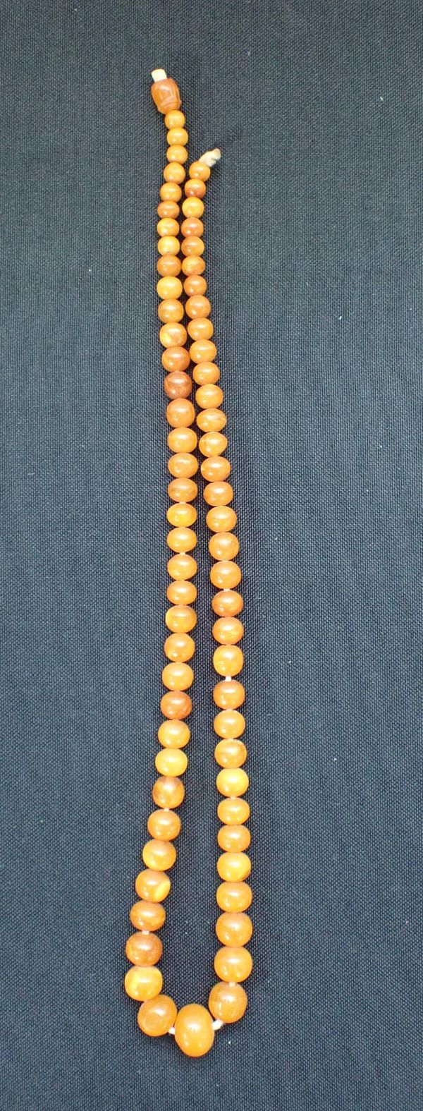 AN AMBER NECKLACE