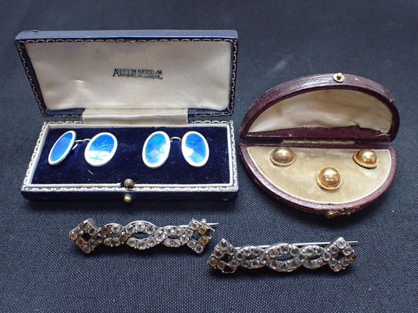 A BOXED SET OF SILVER AND ENAMEL CUFF LINKS