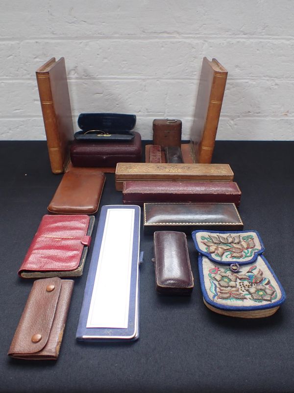 A PAIR OF DUMMY BOOK LEATHER BOOKENDS