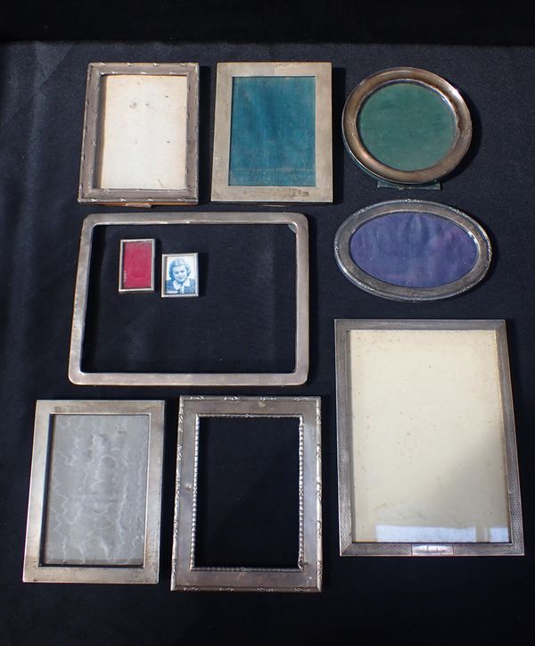 A COLLECTION OF SILVER PHOTOGRAPH FRAMES