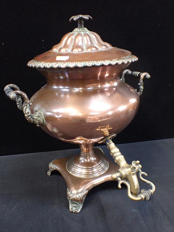 A 19TH CENTURY COPPER TEA/WATER URN