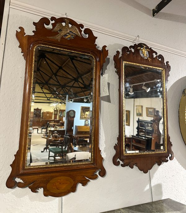 A GEORGE II STYLE MAHOGANY AND PARCEL GILT PIER MIRROR