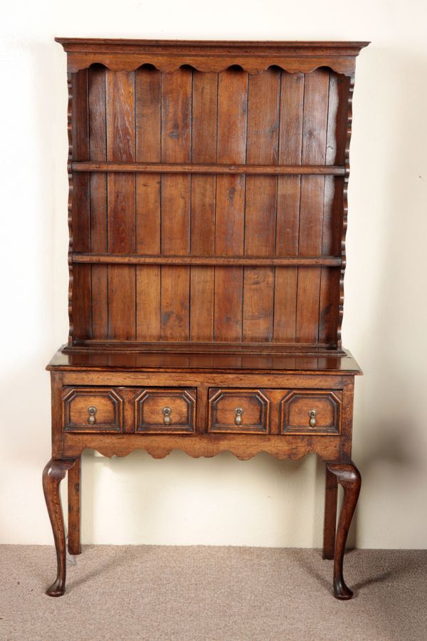 A GEORGE III OAK DRESSER OF SMALL PROPORTIONS