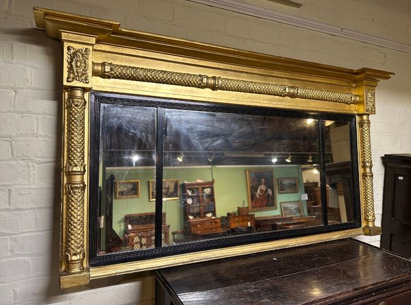 A REGENCY GILTWOOD OVERMANTEL MIRROR