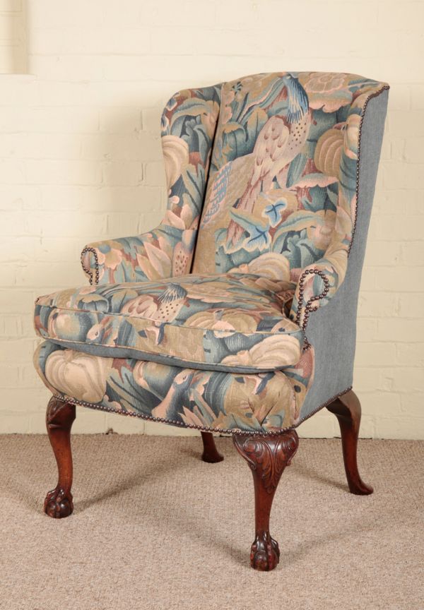 A GEORGE II STYLE WALNUT WINGBACK ARMCHAIR