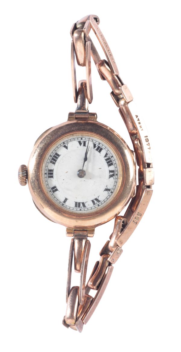 VERTEX: A LADY'S 9CT GOLD WRISTWATCH