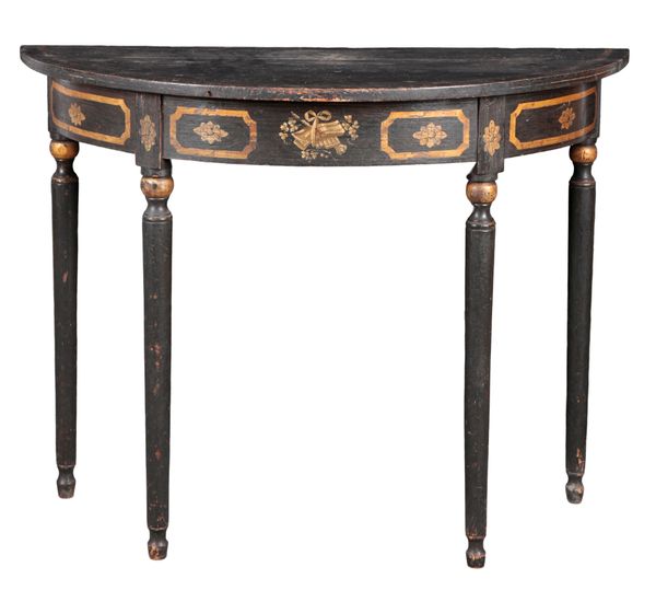 A BLACK PAINTED AND PARCEL GILT DEMI-LUNE CONSOLE TABLE