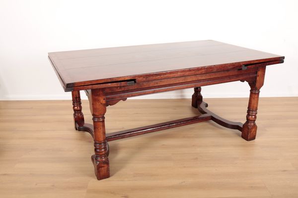 A REPRODUCTION HARDWOOD DRAWLEAF REFECTORY TABLE