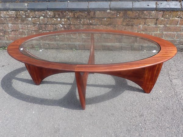 A MID-CENTURY G-PLAN ASTRO OVAL COFFEE TABLE