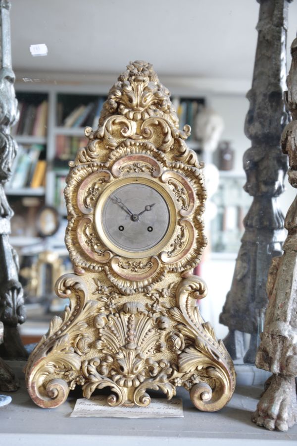 A FRENCH GILT GESSO MANTEL CLOCK