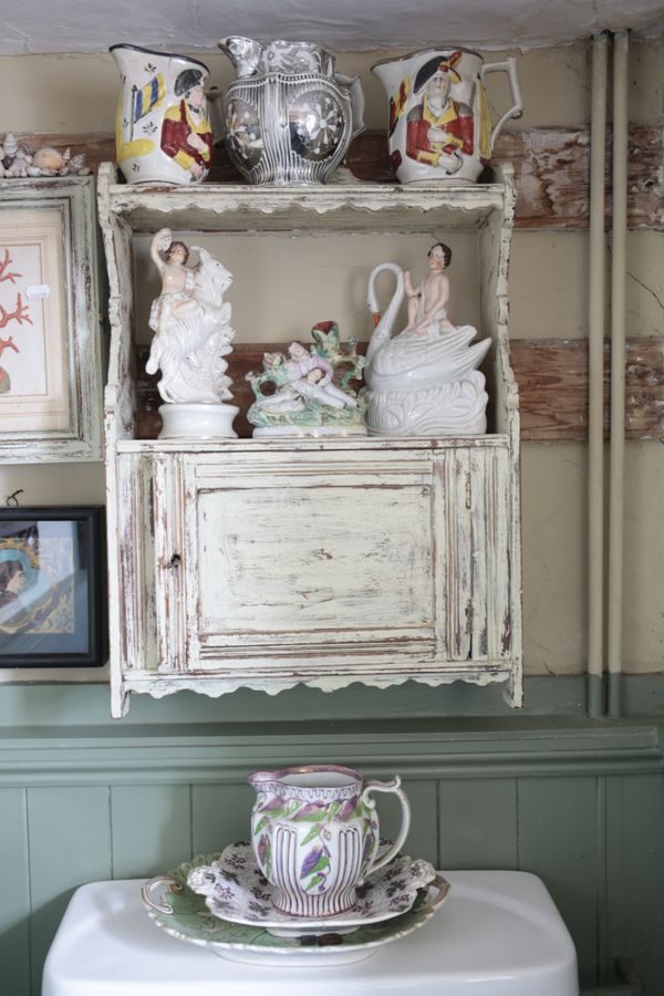 AN EDWARDIAN CREAM-PAINTED WOOD WALL CABINET