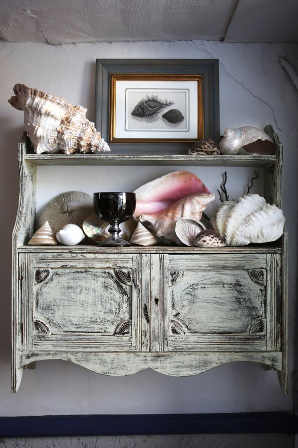 A LATE VICTORIAN CREAM-PAINTED WALL CABINET
