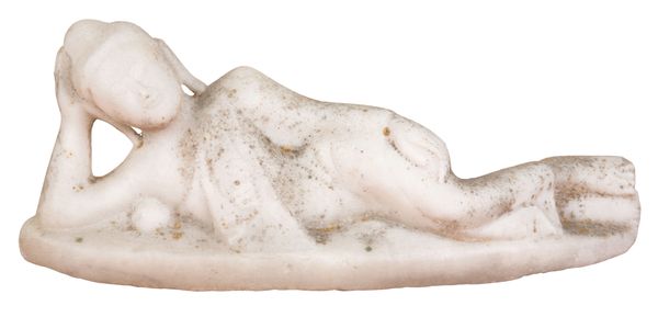 AN INDIAN ALABASTER CARVING OF A RECLINING BUDDHA