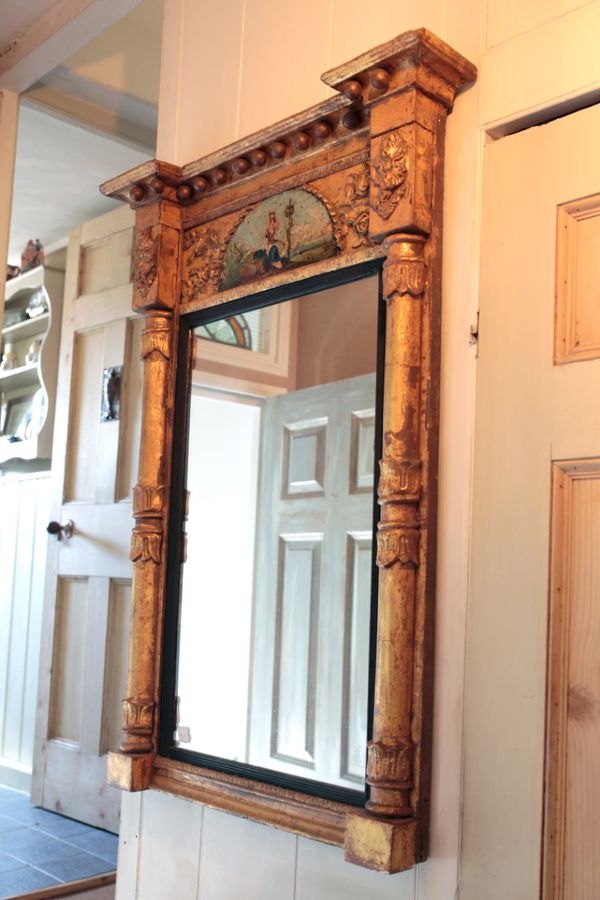A GILT PIER MIRROR