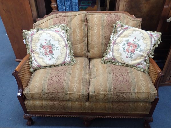 A MAHOGANY FRAMED BERGERE SOFA