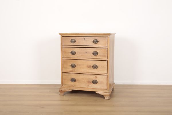 A VICTORIAN PINE CHEST OF DRAWERS