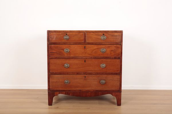 A GEORGE III MAHOGANY CHEST OF DRAWERS