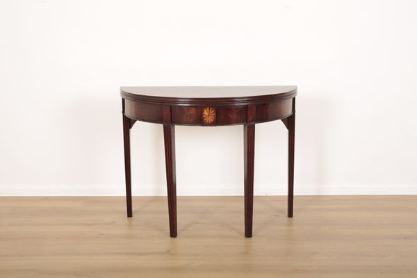 A GEORGE III MAHOGANY DEMI-LUNE TEA OR CARD TABLE