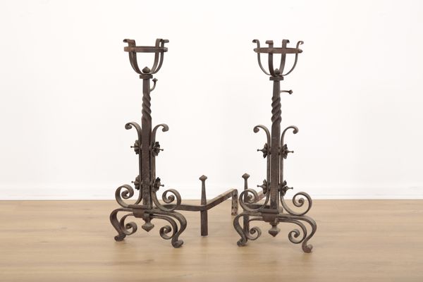 A PAIR OF GOTHIC REVIVAL STYLE WROUGHT IRON ANDIRONS