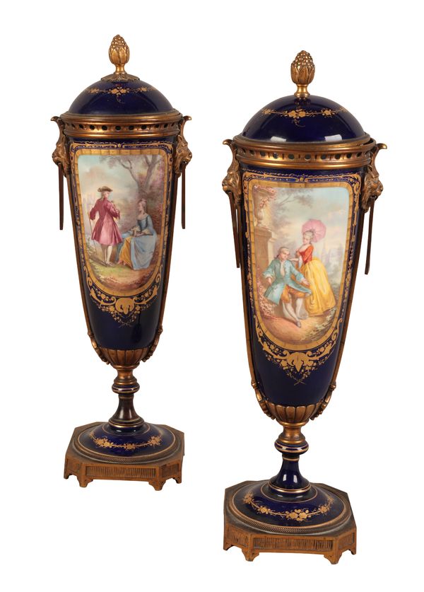 A PAIR OF SÈVRES PORCELAIN VASES AND COVERS