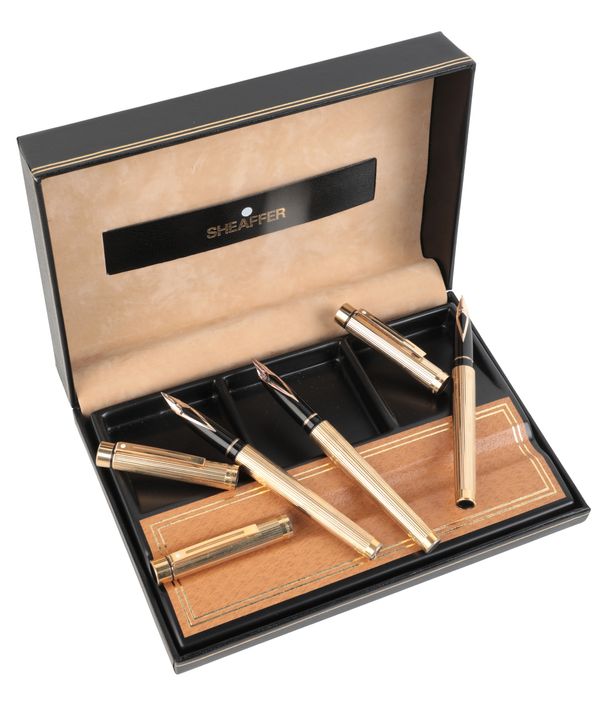 THREE SHEAFFER GOLD PLATED FOUNTAIN PENS