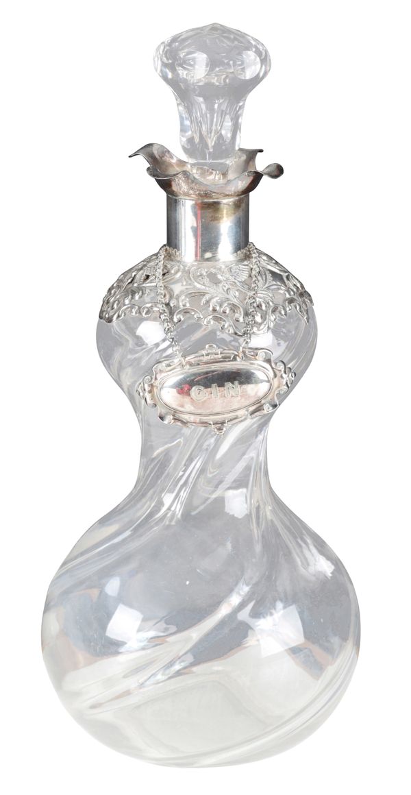 A VICTORIAN SILVER MOUNTED CLEAR GLASS DECANTER
