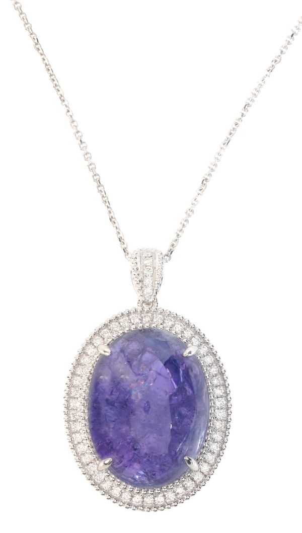 A TANZANITE AND DIAMOND PENDANT NECKLACE