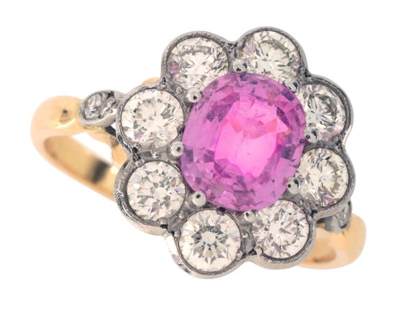 A PINK SAPPHIRE AND DIAMOND CLUSTER RING