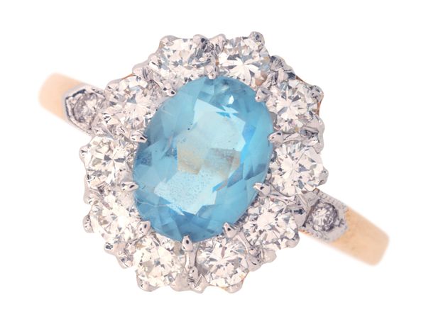 A VINTAGE AQUAMARINE AND DIAMOND CLUSTER RING
