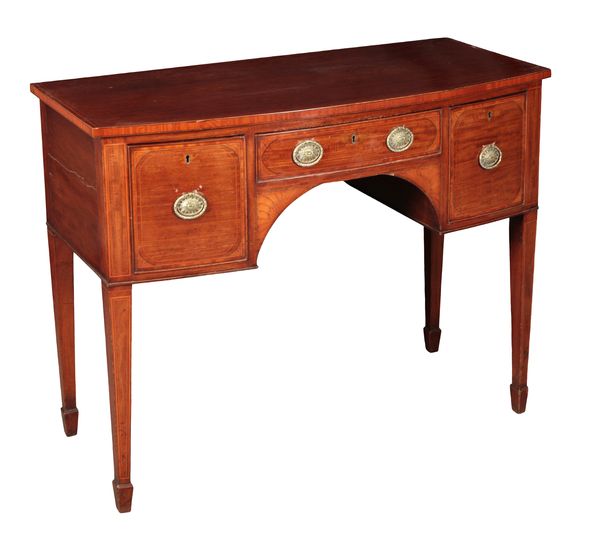 A LATE GEORGE III MAHOGANY BOWFRONT SIDEBOARD