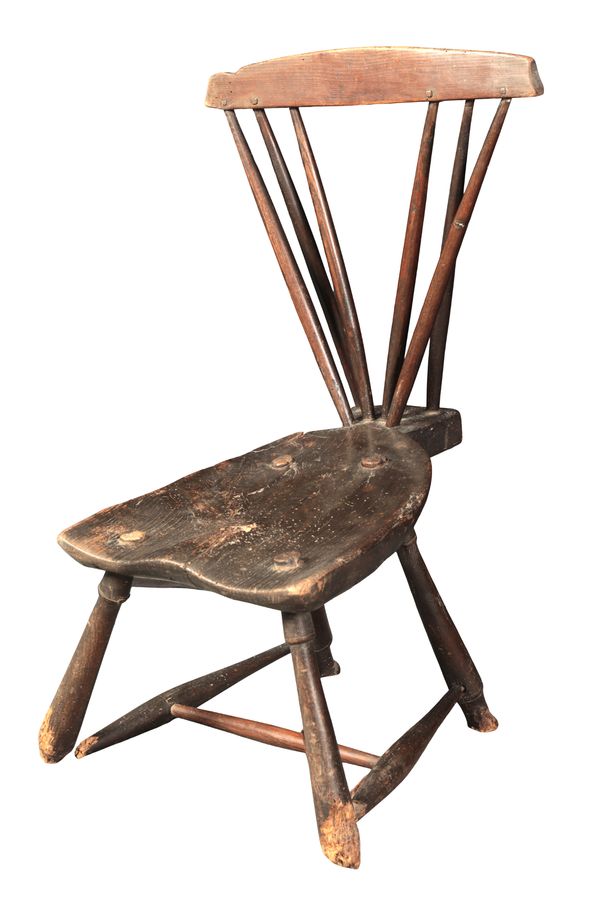 A PRIMITIVE BLACK-PAINTED STICK BACK CHAIR