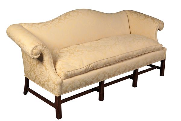 A GEORGE III STYLE MAHOGANY CAMEL BACK SOFA