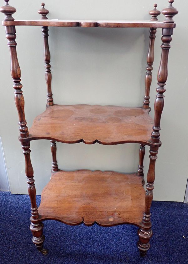 AN EARLY VICTORIAN ROSEWOOD THREE-TIER WHAT-NOT