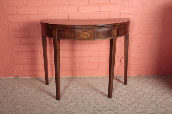 A GEORGE III MAHOGANY DEMI-LUNE TEA TABLE