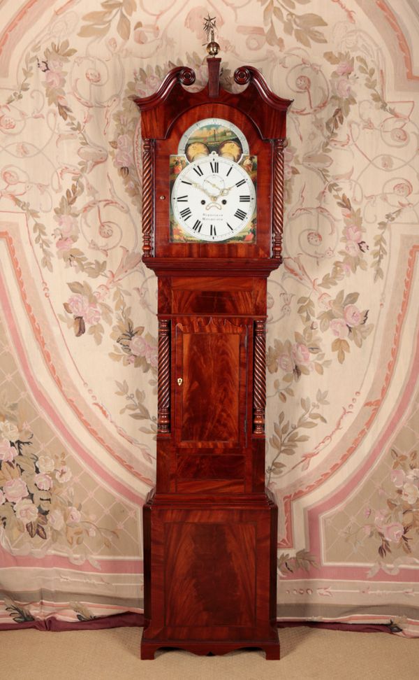 A MAHOGANY LONGCASE CLOCK BY WILLIAM WARMISHAM, MANCHESTER