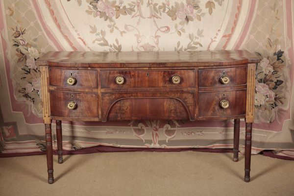 A REGENCY MAHOGANY BOWFRONT SIDEBOARD