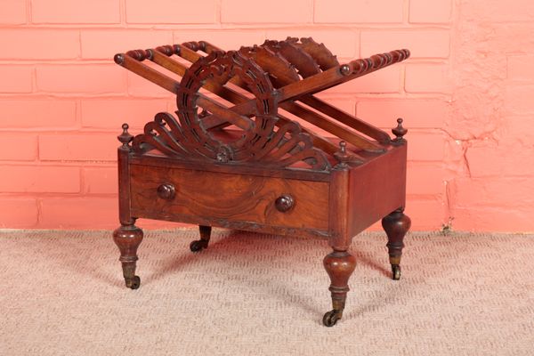 A WILLIAM IV WALNUT CANTERBURY AFTER A DESIGN BY J. C. LOUDEN