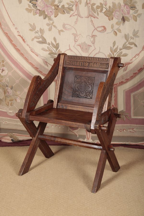 AN OAK 'GLASTONBURY' ARMCHAIR