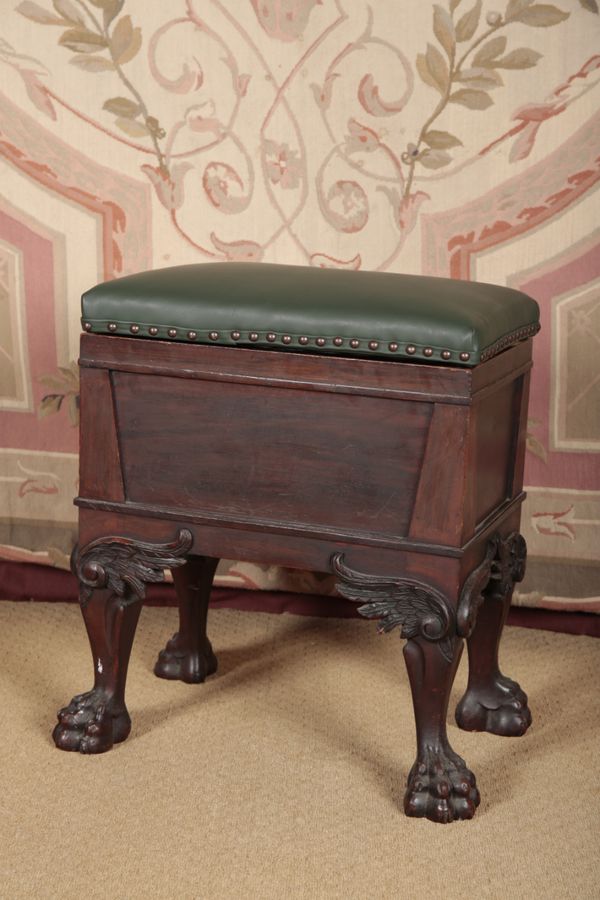 AN EDWARDIAN MAHOGANY PIANO STOOL